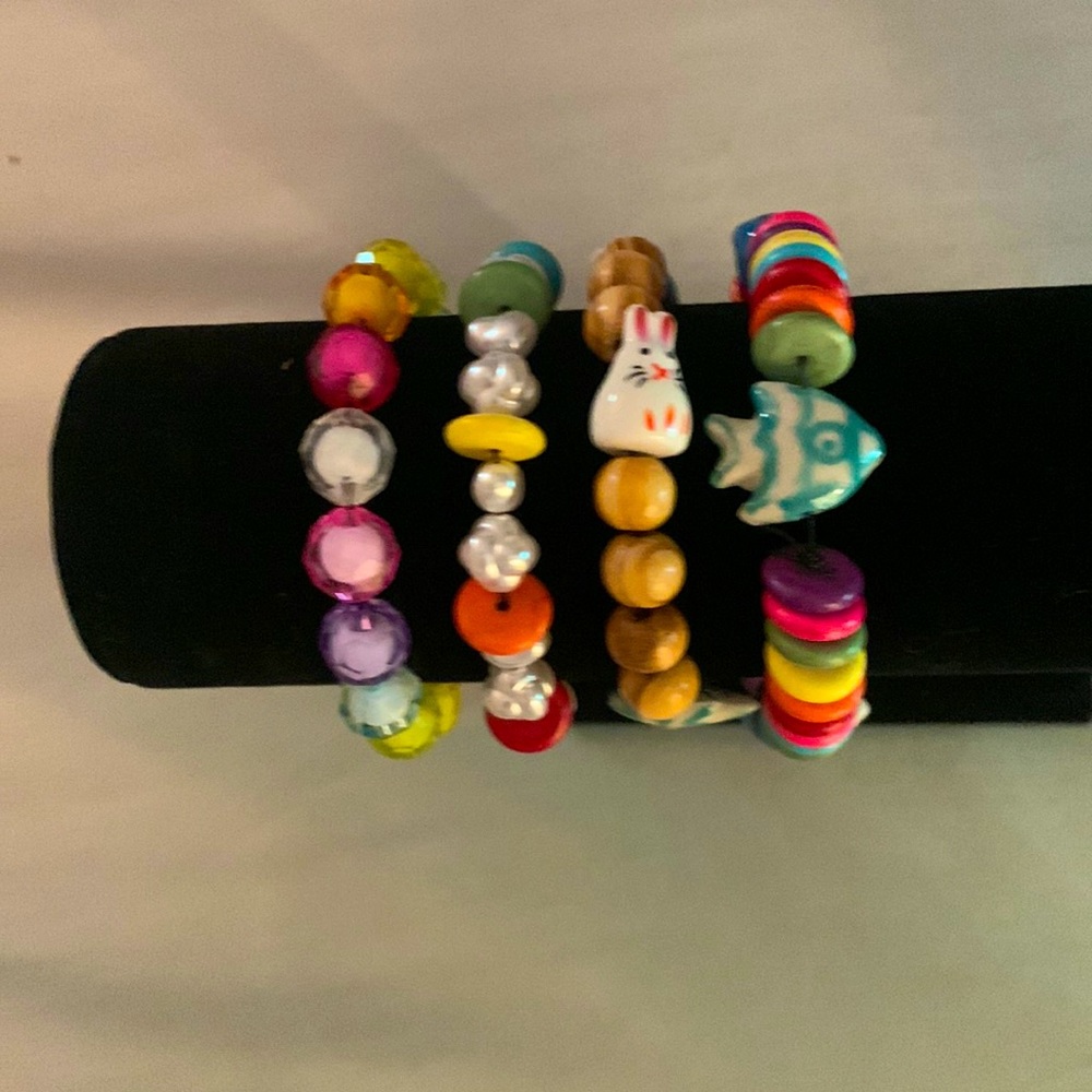 Annoyed opossum rainbow beaded bracelets, animal beads